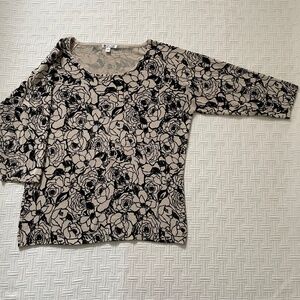 Black and cream sweater.